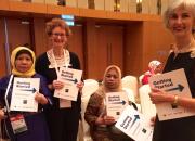 Teresa Hackett, EIFL Copyright and Libraries Programme Manager and Victoria Owen, University of Toronto Scarborough, share copies of the new Marrakesh Treaty guide launched at IFLA WLIC 2018 in Kuala Lumpur.
