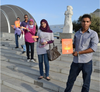 Photo of four researchers and students in Egypt advocating for open access. Photo of four researchers and students in Egypt advocating for open access.