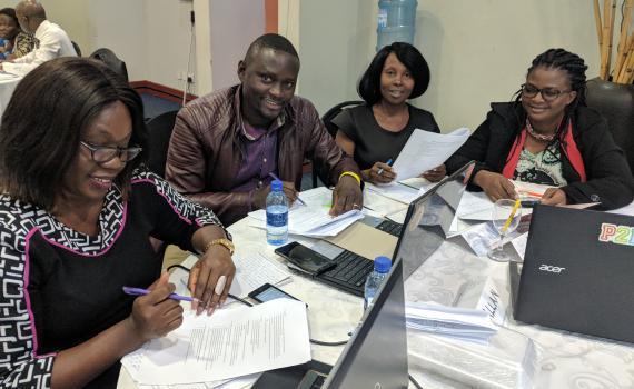 A group of Zambian public librarians writing a curriculum during an EIFL-PLIP workshop.