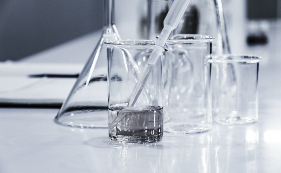 Stock photo with beakers representing science. Image by Hans Reniers.